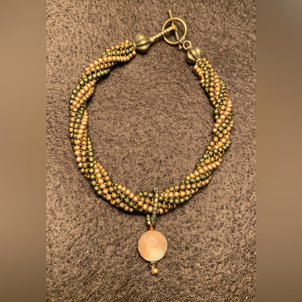 Beaded Kumihimo Bracelet With Toggle Clasp & Stone Charm 
8 1/4”-8 1/2” Length